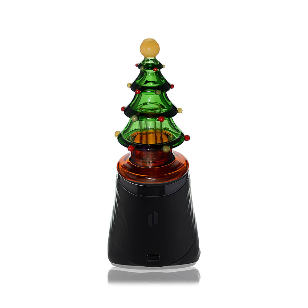 Calibear Christmas tree glass top attachment with layered green branches shown on a Puffco Peak device and standalone.