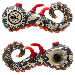 A smoking pipe with a sandblasted sealife design, featuring a dark color palette and red accents.