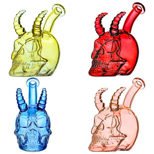 Handcrafted glass skull and horn dab rigs in yellow, red, blue, and pink translucent colors with a 14mm joint on a white background.